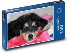 Štěně ležící na růžové dece Puzzle 130 dílků - 28,7 x 20 cm