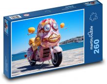 Růžový motocykl na pláži Puzzle 260 - 41x28,7 cm