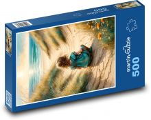 Dítě sedící na pláži u moře Puzzle 500 - 46x30 cm