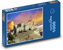 Burg auf dem Felsen bei Sonnenuntergang Puzzle 1000 Teile - 60 x 46 cm