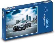 Samochód sportowy w mieście Puzzle 1000 elementów - 60x46 cm