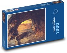 Jaskinia nad morzem - skała, zachód słońca Puzzle 1000 elementów - 60x46 cm