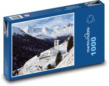 Zimní krajina - zasněžené hory, kostel Puzzle 1000 dílků - 60 x 46 cm