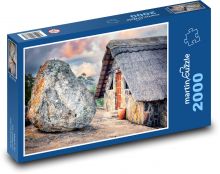Kamenný domek s velkým balvanem Puzzle 2000 dílků - 90 x 60 cm
