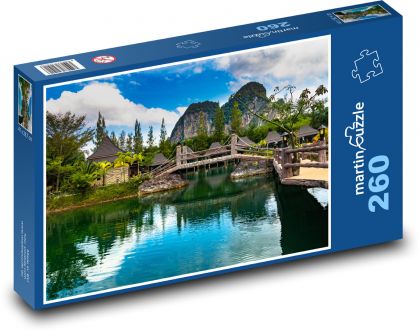 Holzbrücke über grün-blaues Wasser - Puzzle - 260 Teile