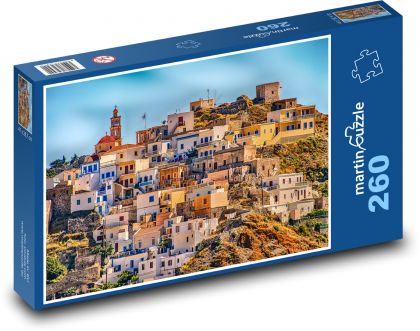 Eine kleine Stadt auf einem Hügel am Meer Karpathos, Griechenland - Puzzle - 260 Teile
