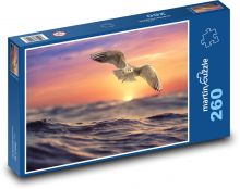 Latająca mewa - zachód słońca nad morzem, chmury Puzzle 260 elementów - 41x28,7 cm