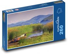 Łódź - jezioro, trzciny Puzzle 260 elementów - 41x28,7 cm
