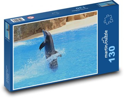 Hravý delfín vo vode - Puzzle 130 dielikov, rozmer 28,7x20 cm 