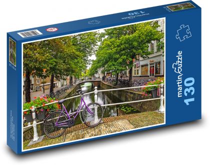 Bike at the railing in the Netherlands - Puzzle 130 pieces, size 28.7x20 cm 