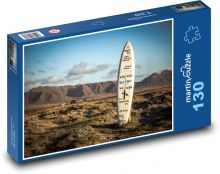 Deska surfingowa utknęła w ziemi Puzzle 130 elementów - 28,7x20 cm