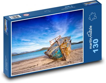 Bootswrack am Strand - Puzzle - 130 Teile