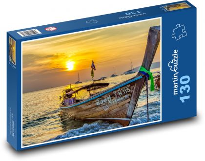 Łódź o zachodzie słońca na morzu - Puzzle 130 elementów, rozmiar 28,7x20 cm