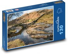 Most, jezero, hory Puzzle 130 dílků - 28,7 x 20 cm