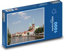 Lübeck - městské brány, Německo Puzzle 1000 dílků - 60 x 46 cm