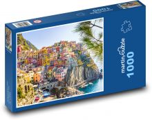 Domy - útes, moře Puzzle 1000 dílků - 60 x 46 cm