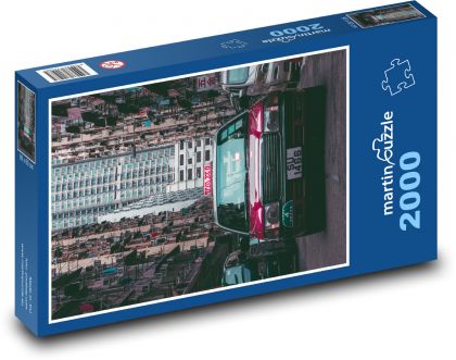 Rotes Taxi auf der Straße - Puzzle - 2000 Teile