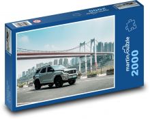 SUV-Auto in der Stadt Puzzle 2000 Teile - 90 x 60 cm