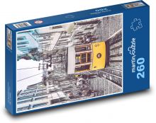 Gelbe Straßenbahn in der Stadt Puzzle 260 Teile - 41 x28,7 cm