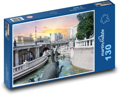 Západ slunce nad městem - puzzle 130 dílků