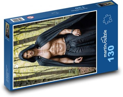 Muscled man in the woods - Puzzle 130 pieces, size 28.7x20 cm 