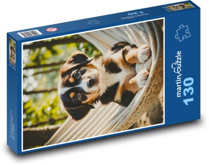 Štěně v houpající síti - puzzle 130 dílků