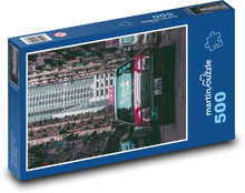 Red taxi on the street Puzzle of 500 pieces - 46 x 30 cm 