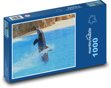 Hravý delfín ve vodě Puzzle 1000 dílků - 60 x 46 cm