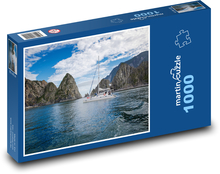 Loď plující mezi skalami Puzzle 1000 dílků - 60 x 46 cm