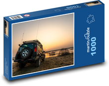 Biebrza - auto pri rieke, západ slnka Puzzle 1000 dielikov - 60 x 46 cm 