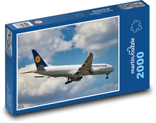 Lietadlo v lete Puzzle 2000 dielikov - 90 x 60 cm