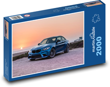 Sportovní auto při západu slunce Puzzle 2000 dílků - 90 x 60 cm