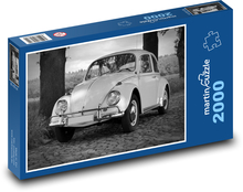 A small car in the forest, a veteran Puzzle 2000 pieces - 90 x 60 cm