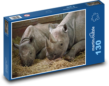 Nashörner ruhen auf Stroh Puzzle 130 Teile - 28,7x20 cm