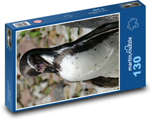 Penguin basking on land Puzzle 130 pieces - 28.7 x 20 cm 