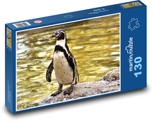 Roztomilý tučniak na skale Puzzle 130 dielikov - 28,7 x 20 cm 