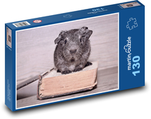 Guinea pig sitting on a book Puzzle 130 pieces - 28.7 x 20 cm 