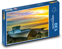 Boot bei Sonnenuntergang an Land Puzzle 130 Teile - 28,7x20 cm