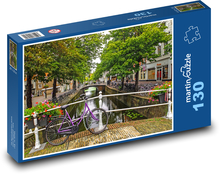 Bike at the railing in the Netherlands Puzzle 130 pieces - 28.7 x 20 cm 