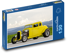 Gelbes Auto in Berglandschaft Puzzle 130 Teile - 28,7x20 cm