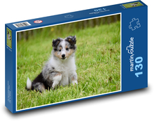 Welpe im Gras Puzzle 130 Teile - 28,7x20 cm
