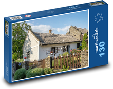 Dach kryty strzechą - Węgry, dom Puzzle 130 elementów - 28,7x20 cm