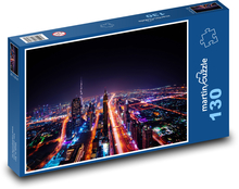 Dubaj - mrakodrap, město v noci Puzzle 130 dílků - 28,7 x 20 cm