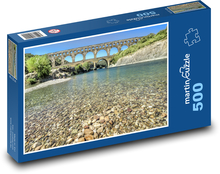 Průzračná řeka pod akvaduktem - Pont du Gard, Francie Puzzle 500 dílků - 46 x 30 cm