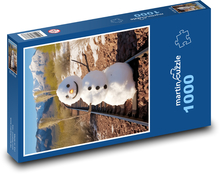 Schneemann auf Schienen Puzzle 1000 Teile - 60 x 46 cm