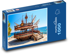 Loď na pláži Puzzle 1000 dílků - 60 x 46 cm