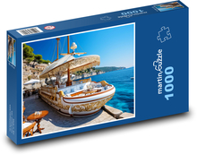Kanapa - łódź, plaża Puzzle 1000 elementów - 60x46 cm
