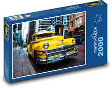Żółta taksówka na ulicy w Kanadzie Puzzle 2000 elementów - 90x60 cm
