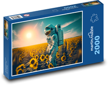 Astronauta na polu słonecznika Puzzle 2000 elementów - 90x60 cm