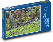 Grazing cows in the mountain landscape Puzzle 2000 pieces - 90 x 60 cm